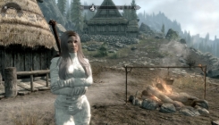 The Elder Scrolls 5: Skyrim - girl near the fire