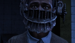 Saw: The Video Game: face in the device screenshot